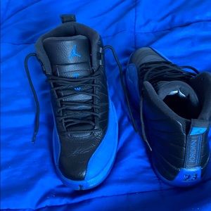 Blue and black Jordan 12s